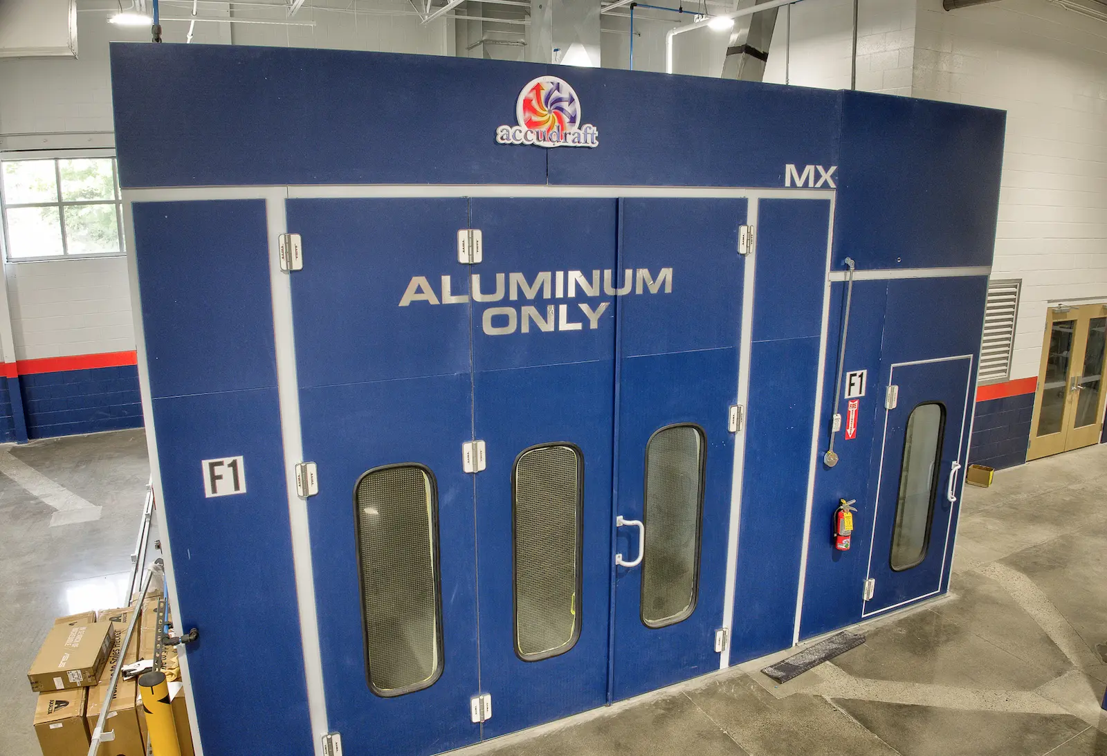 Automobile repair shop interior with service equipment